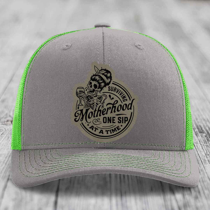 Surviving Motherhood, One Sip At A Time - Leather Patch Hat - Light Brown to Black Patch - Richardson 112 Snapback Trucker Hat