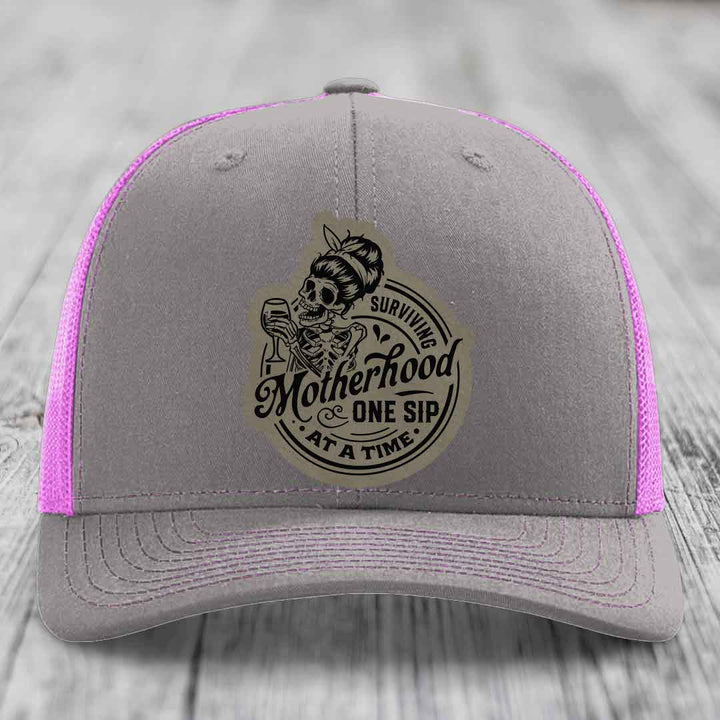 Surviving Motherhood, One Sip At A Time - Leather Patch Hat - Light Brown to Black Patch - Richardson 112 Snapback Trucker Hat