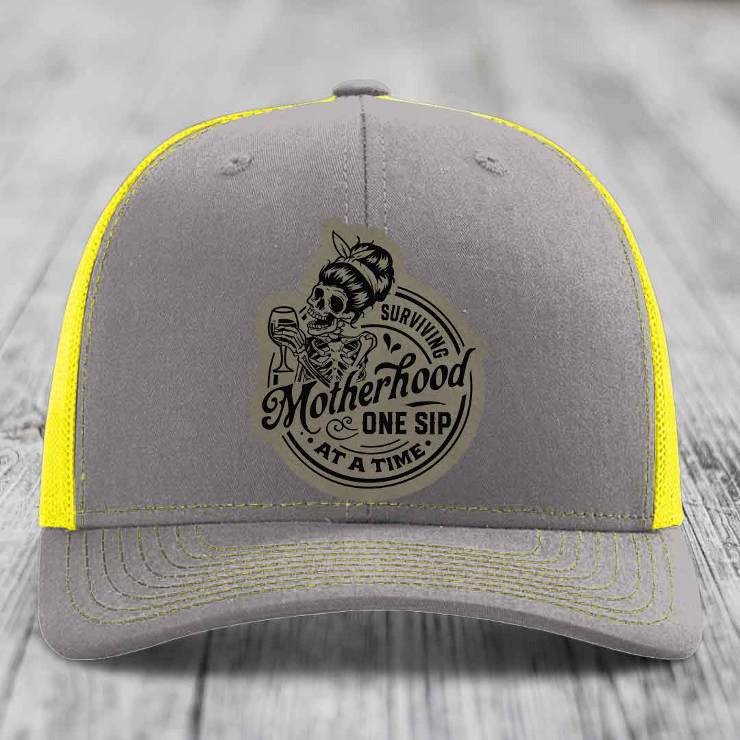 Surviving Motherhood, One Sip At A Time - Leather Patch Hat - Light Brown to Black Patch - Richardson 112 Snapback Trucker Hat