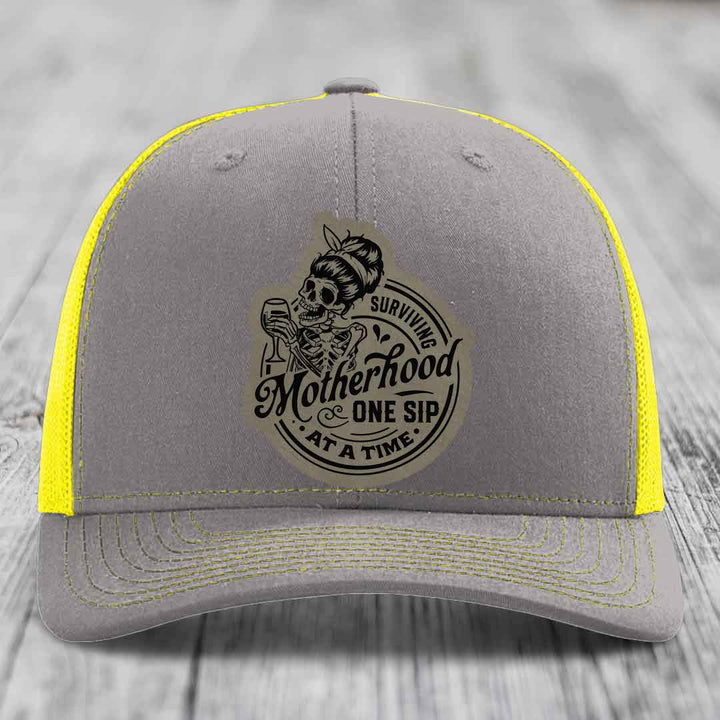 Surviving Motherhood, One Sip At A Time - Leather Patch Hat - Light Brown to Black Patch - Richardson 112 Snapback Trucker Hat