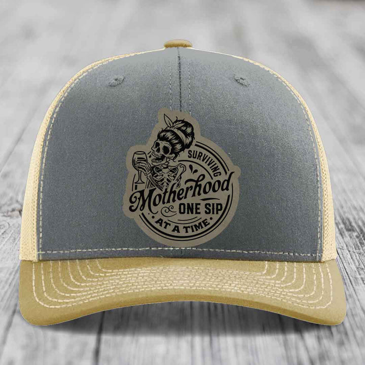 Surviving Motherhood, One Sip At A Time - Leather Patch Hat - Light Brown to Black Patch - Richardson 112 Snapback Trucker Hat
