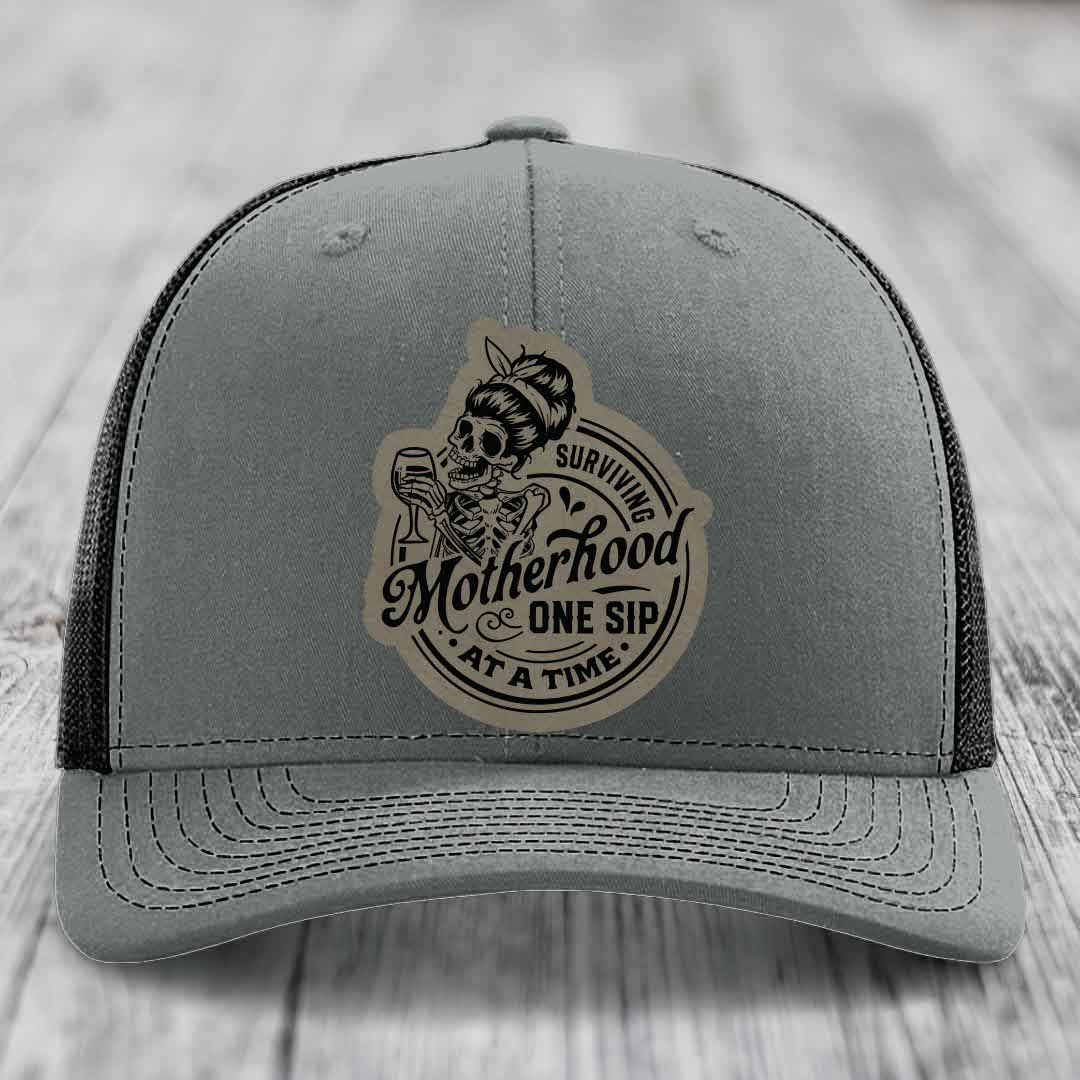 Surviving Motherhood, One Sip At A Time - Leather Patch Hat - Light Brown to Black Patch - Richardson 112 Snapback Trucker Hat