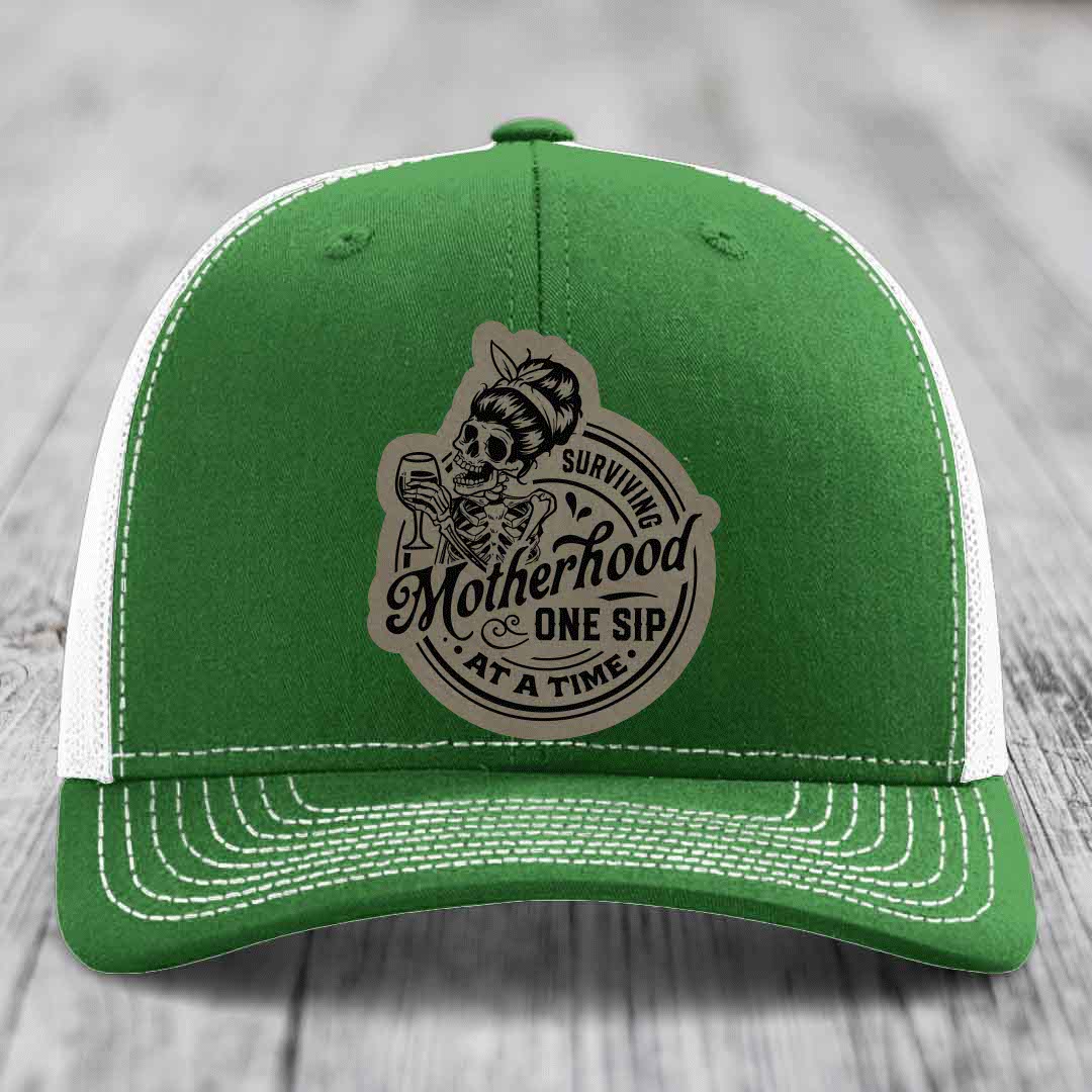 Surviving Motherhood, One Sip At A Time - Leather Patch Hat - Light Brown to Black Patch - Richardson 112 Snapback Trucker Hat
