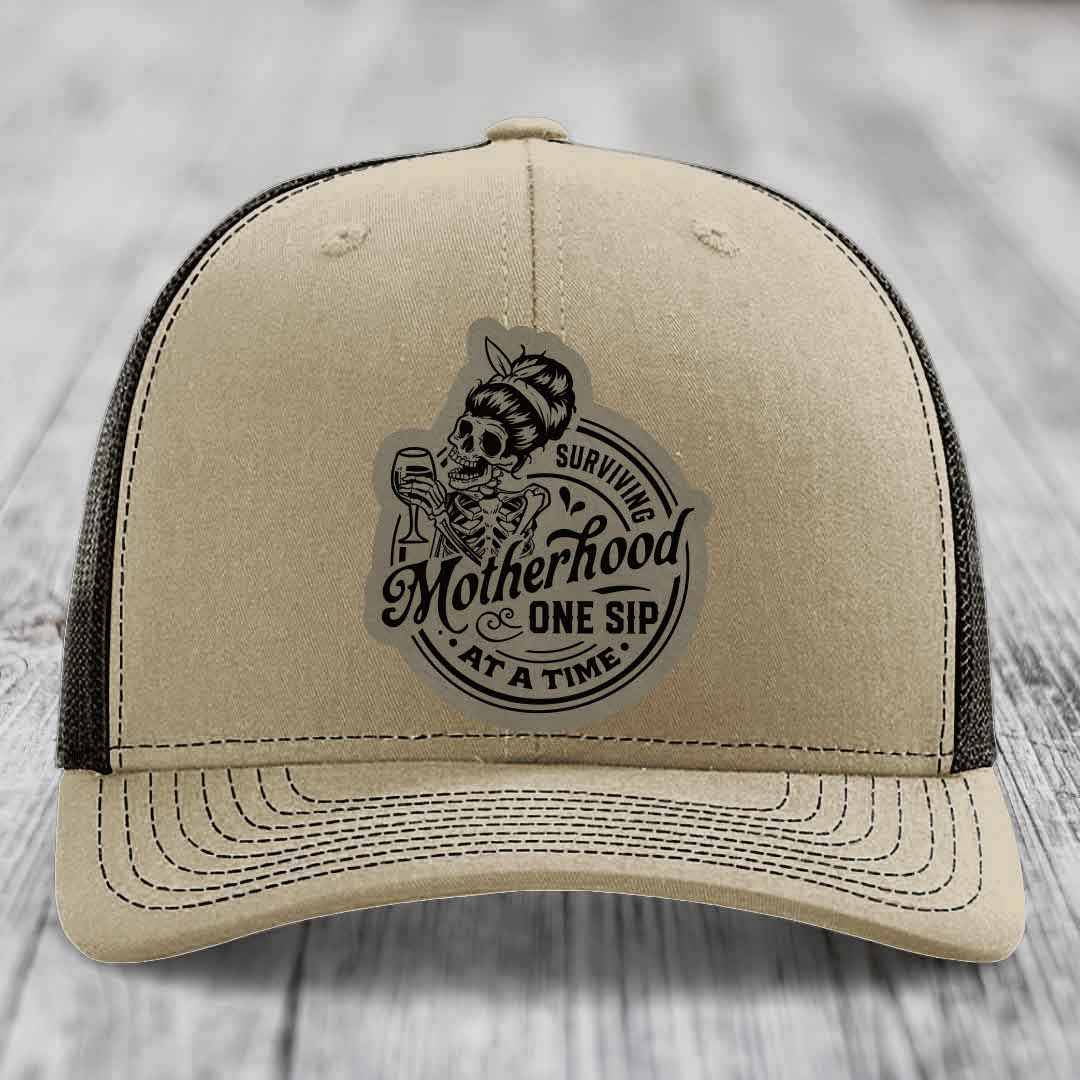 Surviving Motherhood, One Sip At A Time - Leather Patch Hat - Light Brown to Black Patch - Richardson 112 Snapback Trucker Hat
