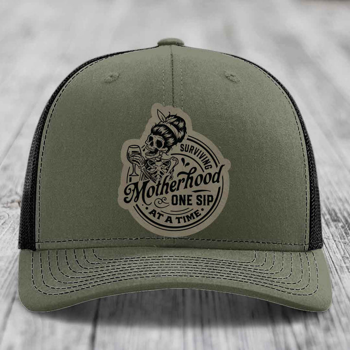 Surviving Motherhood, One Sip At A Time - Leather Patch Hat - Light Brown to Black Patch - Richardson 112 Snapback Trucker Hat