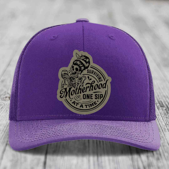 Surviving Motherhood, One Sip At A Time - Leather Patch Hat - Light Brown to Black Patch - Richardson 112 Snapback Trucker Hat