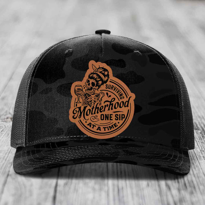 Surviving Motherhood, One Sip At A Time - Leather Patch Hat - Rawhide to Black Patch - Richardson 112PFP Snapback Trucker Hat