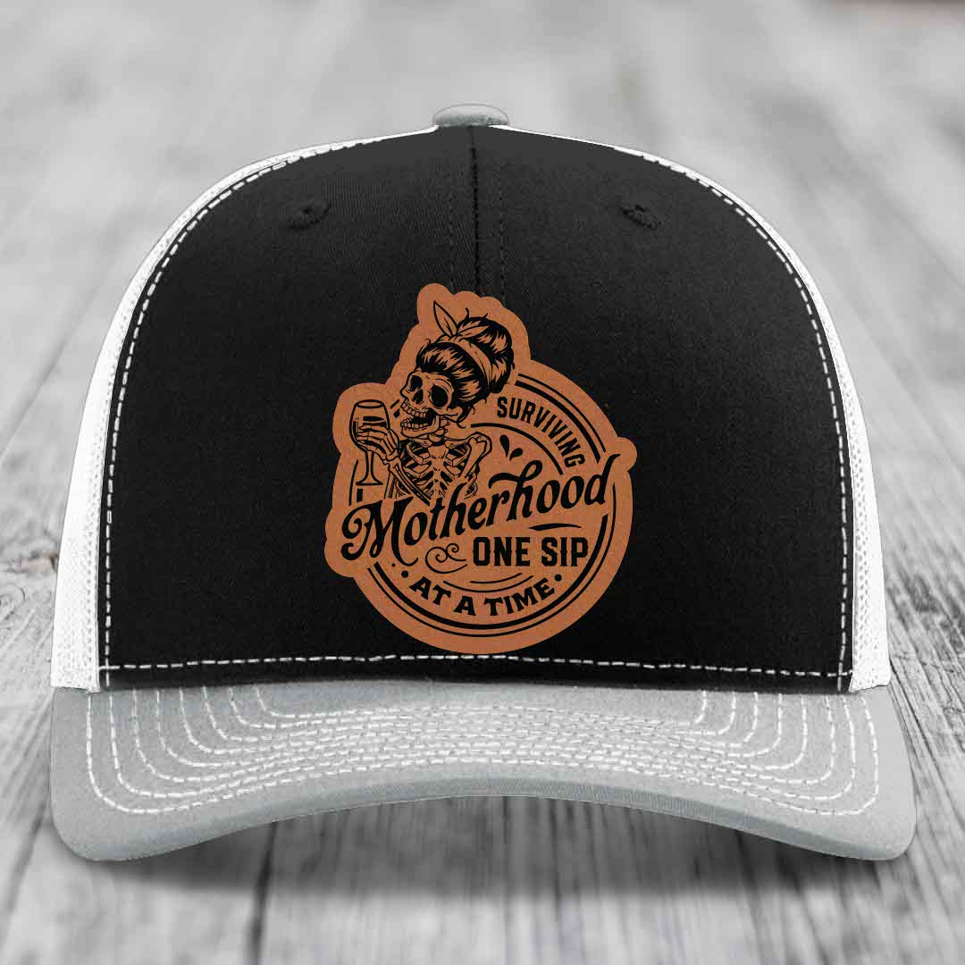 Surviving Motherhood, One Sip At A Time - Leather Patch Hat - Rawhide to Black Patch - Richardson 112 Snapback Trucker Hat