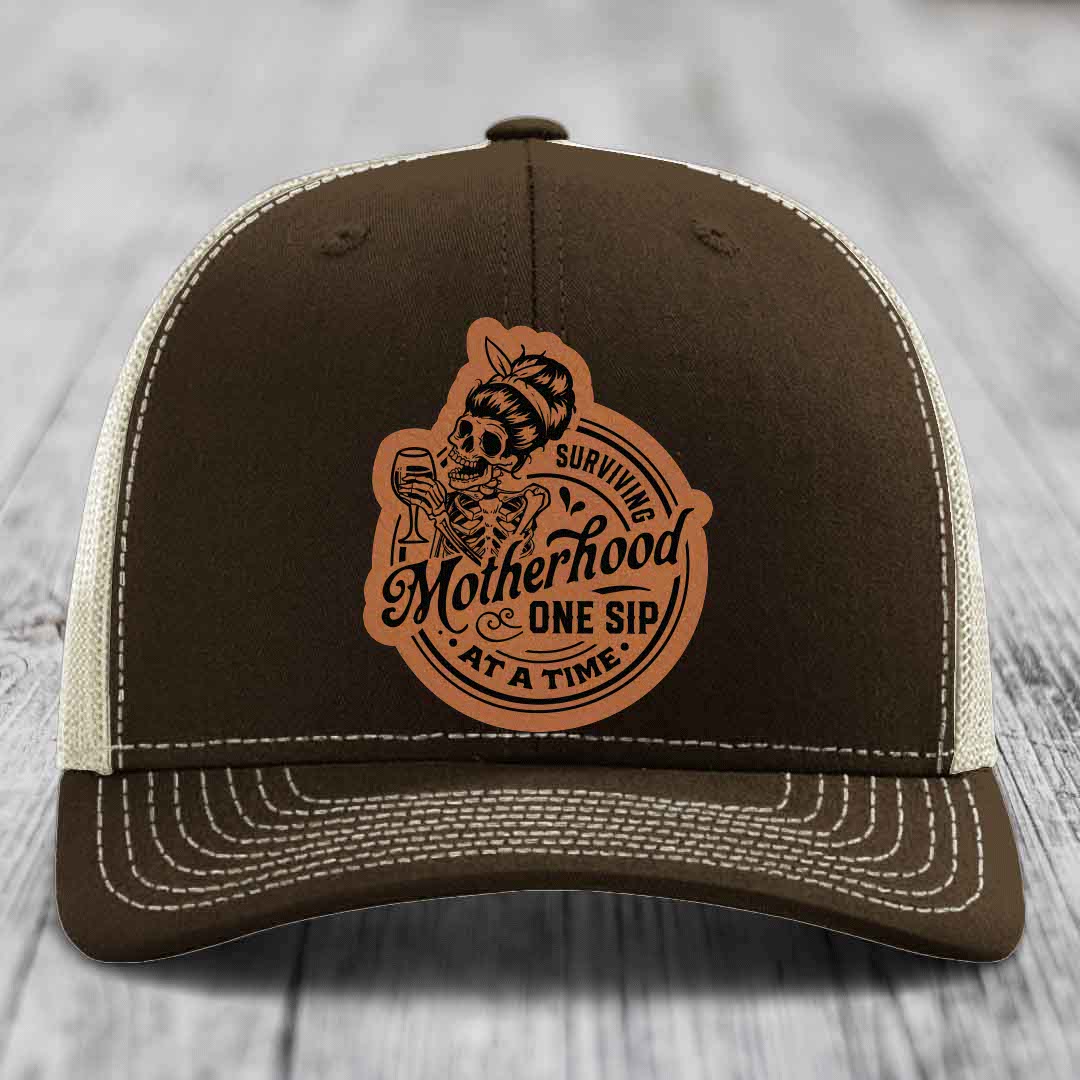 Surviving Motherhood, One Sip At A Time - Leather Patch Hat - Rawhide to Black Patch - Richardson 112 Snapback Trucker Hat