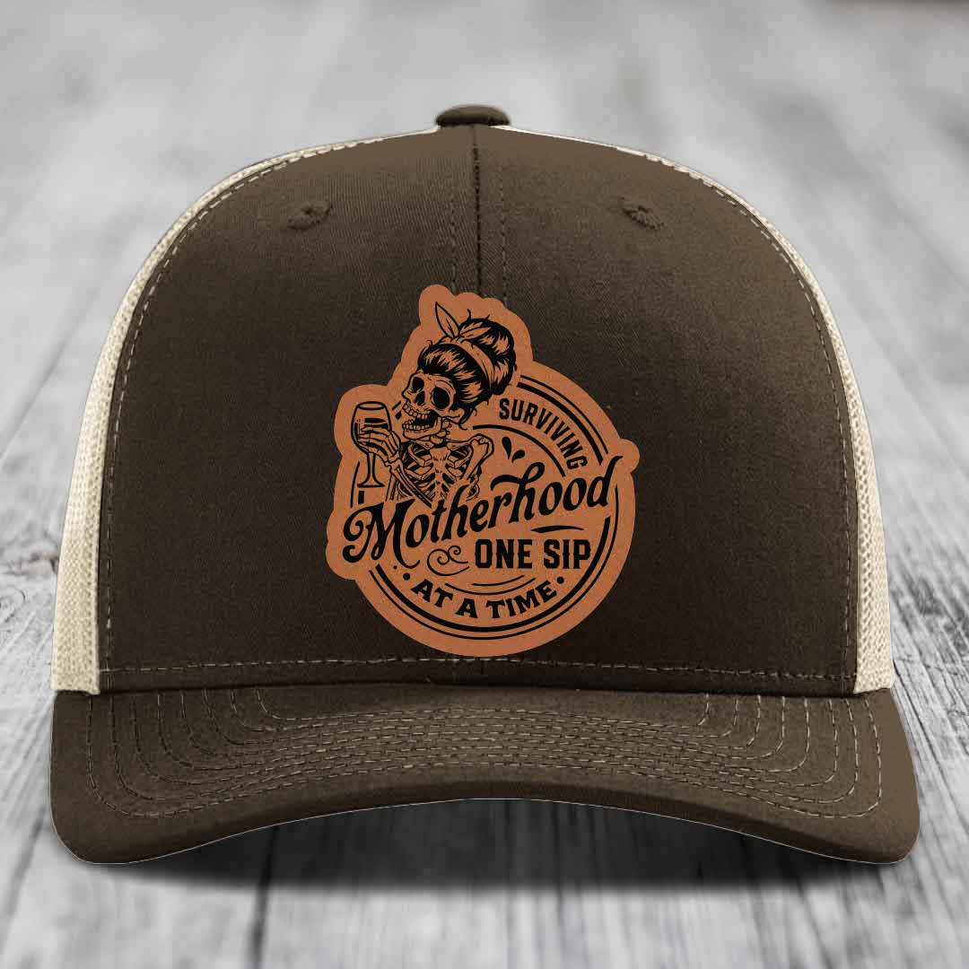 Surviving Motherhood, One Sip At A Time - Leather Patch Hat - Rawhide to Black Patch - Richardson 112 Snapback Trucker Hat