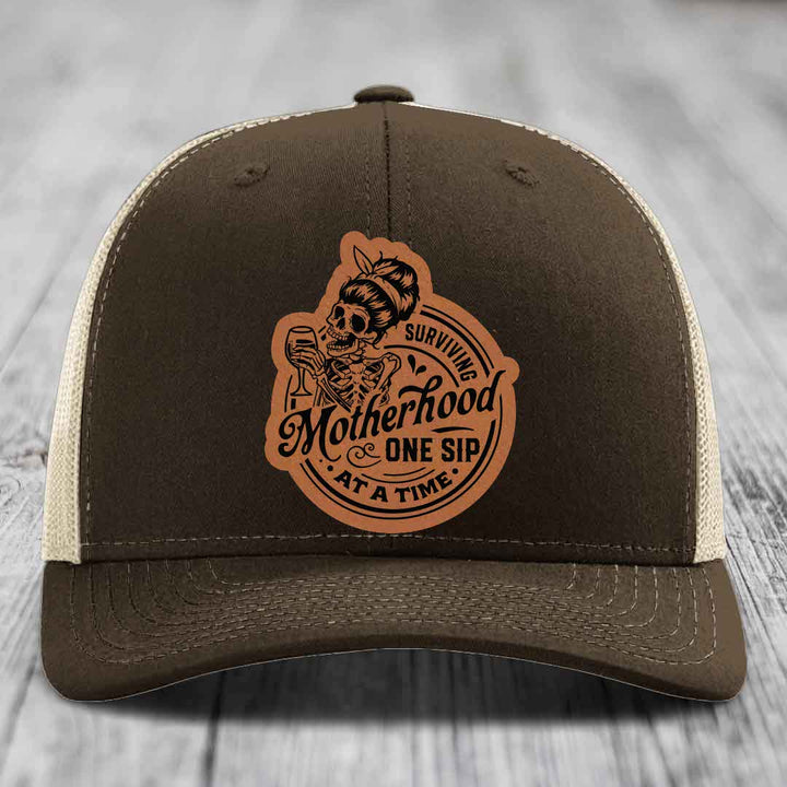 Surviving Motherhood, One Sip At A Time - Leather Patch Hat - Rawhide to Black Patch - Richardson 112 Snapback Trucker Hat