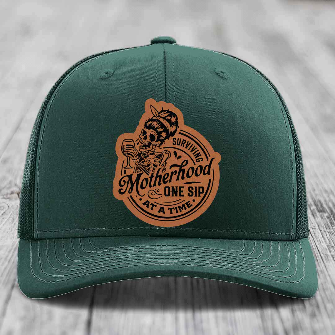 Surviving Motherhood, One Sip At A Time - Leather Patch Hat - Rawhide to Black Patch - Richardson 112 Snapback Trucker Hat