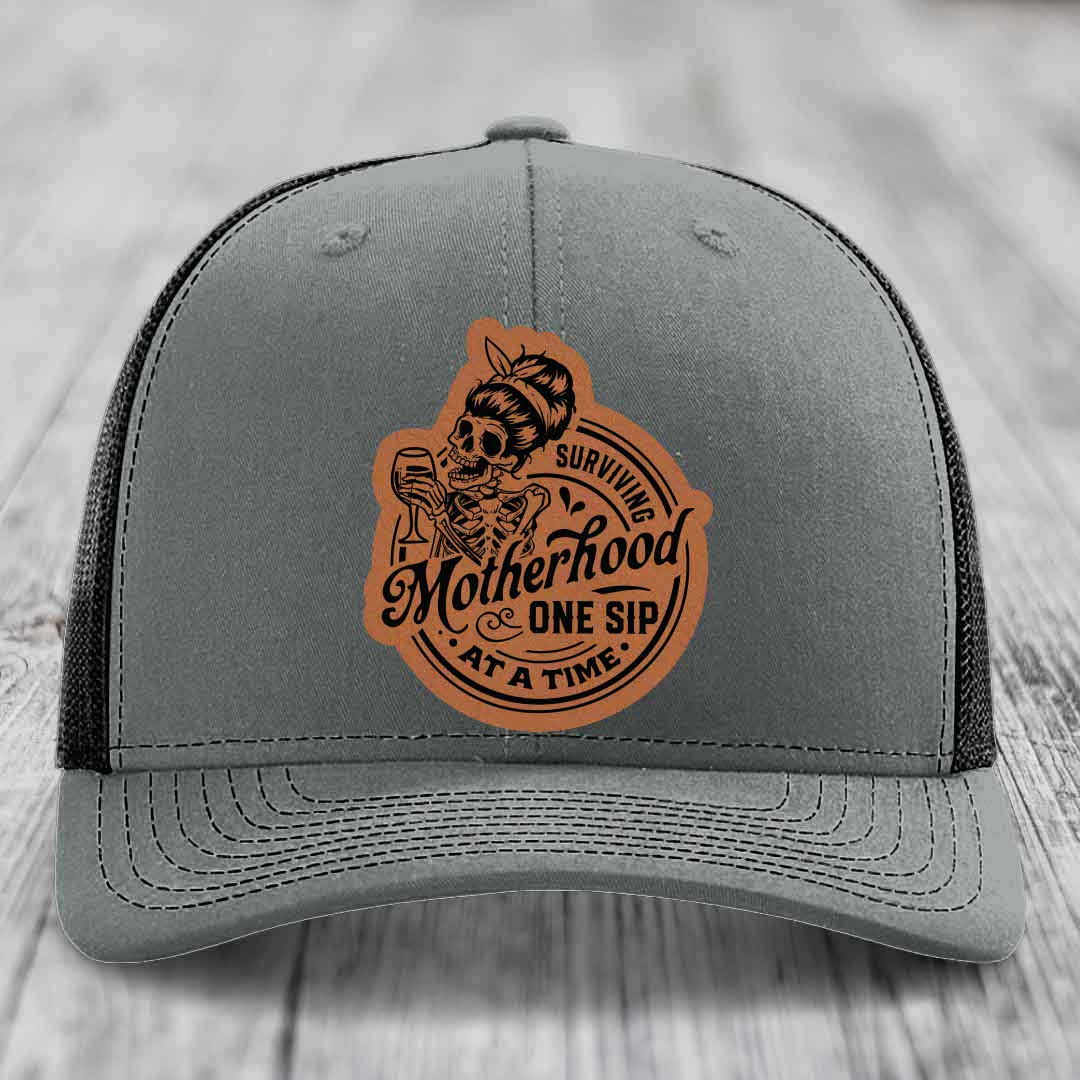 Surviving Motherhood, One Sip At A Time - Leather Patch Hat - Rawhide to Black Patch - Richardson 112 Snapback Trucker Hat