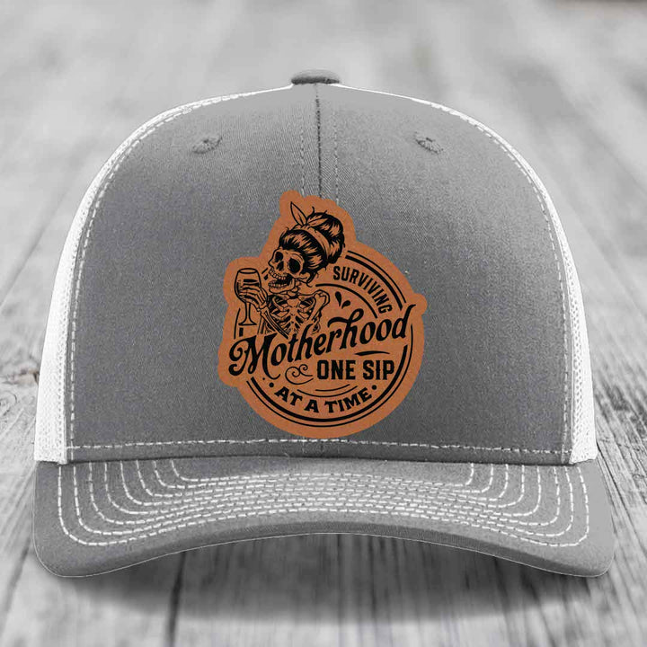 Surviving Motherhood, One Sip At A Time - Leather Patch Hat - Rawhide to Black Patch - Richardson 112 Snapback Trucker Hat