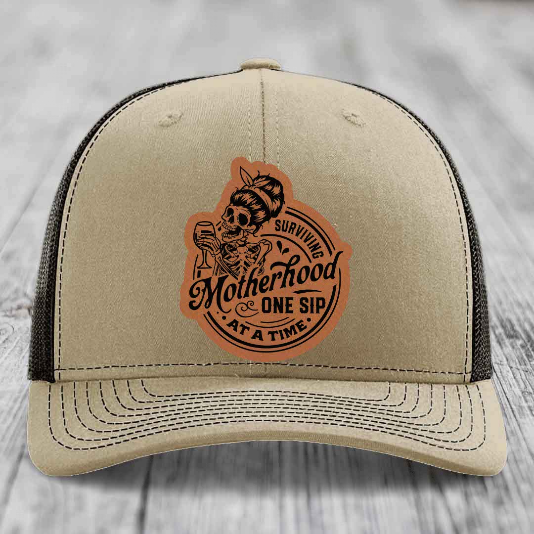 Surviving Motherhood, One Sip At A Time - Leather Patch Hat - Rawhide to Black Patch - Richardson 112 Snapback Trucker Hat