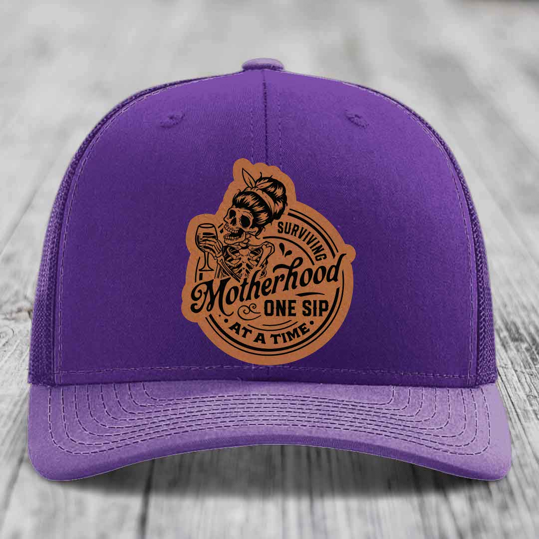 Surviving Motherhood, One Sip At A Time - Leather Patch Hat - Rawhide to Black Patch - Richardson 112 Snapback Trucker Hat