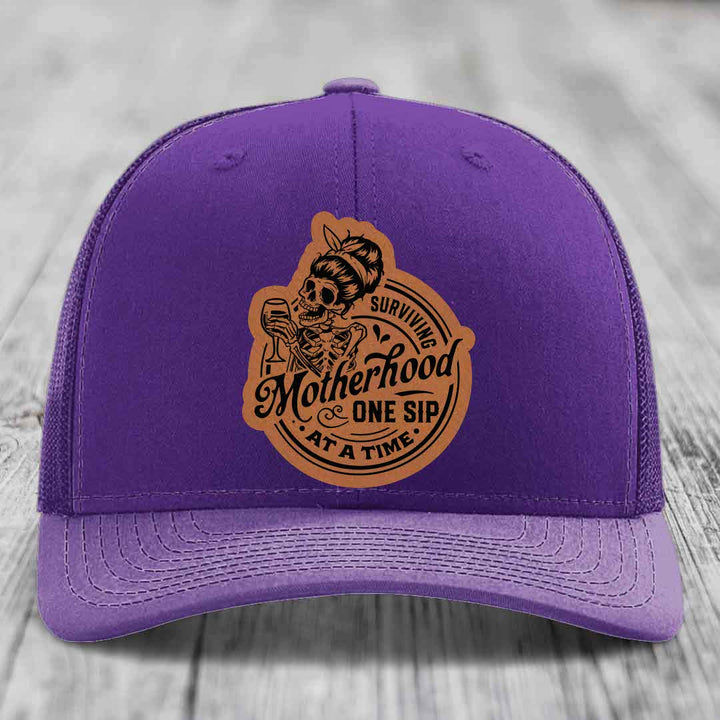 Surviving Motherhood, One Sip At A Time - Leather Patch Hat - Rawhide to Black Patch - Richardson 112 Snapback Trucker Hat