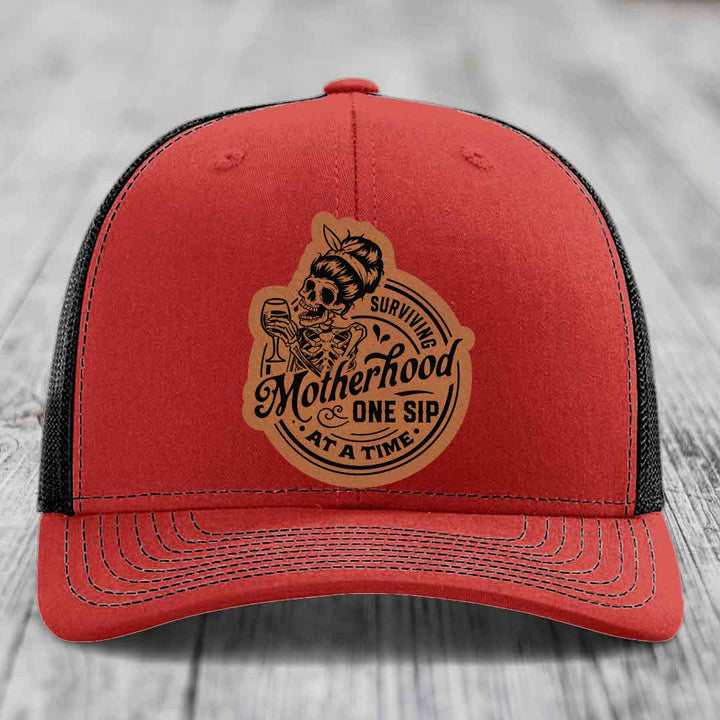 Surviving Motherhood, One Sip At A Time - Leather Patch Hat - Rawhide to Black Patch - Richardson 112 Snapback Trucker Hat