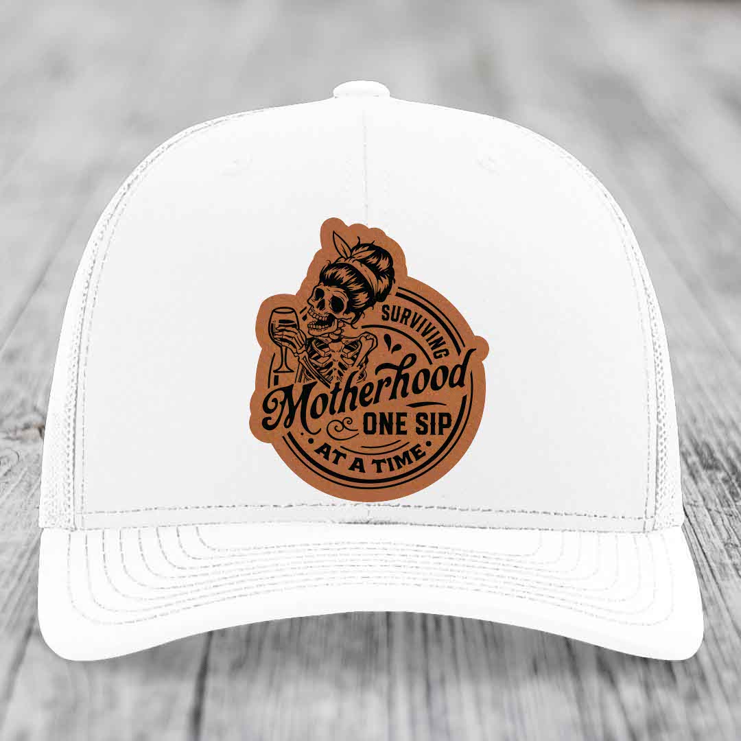 Surviving Motherhood, One Sip At A Time - Leather Patch Hat - Rawhide to Black Patch - Richardson 112 Snapback Trucker Hat