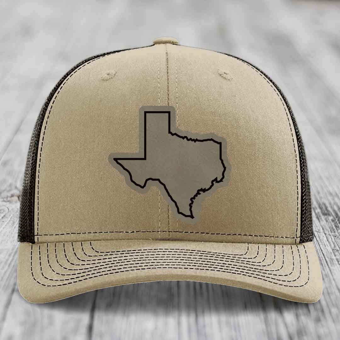 Tan trucker hat with black mesh back and Texas state outline patch on front.