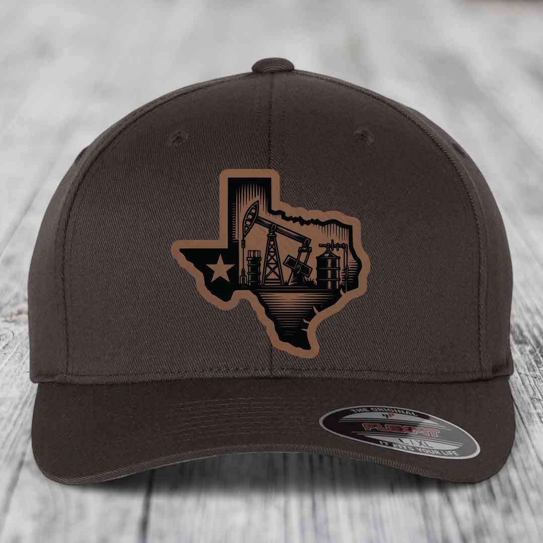 Dark brown Flexfit hat with Texas oilfield patch featuring pumpjacks and star.
