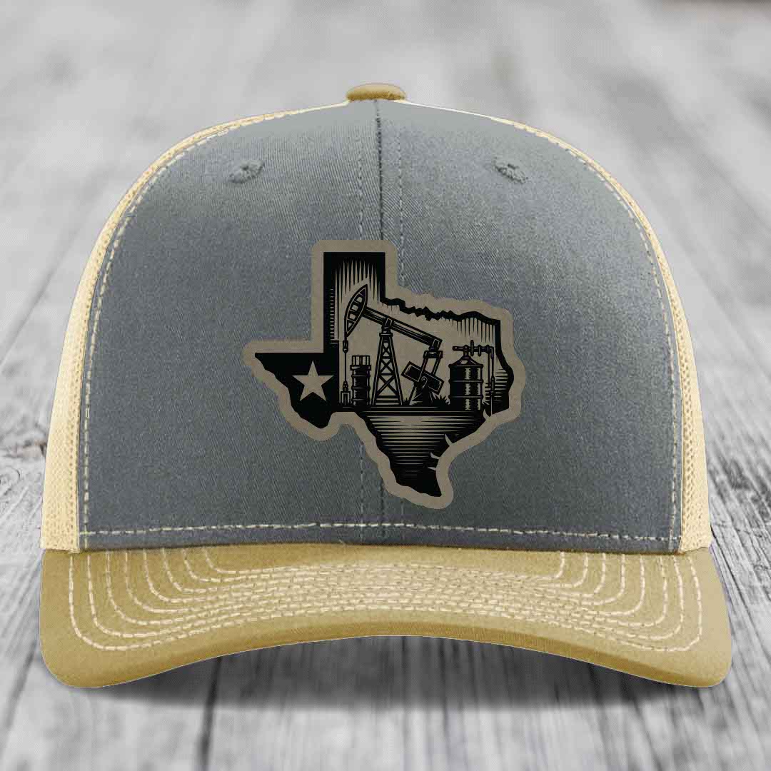 Grey and beige trucker hat with Texas oilfield patch featuring pumpjacks and star.
