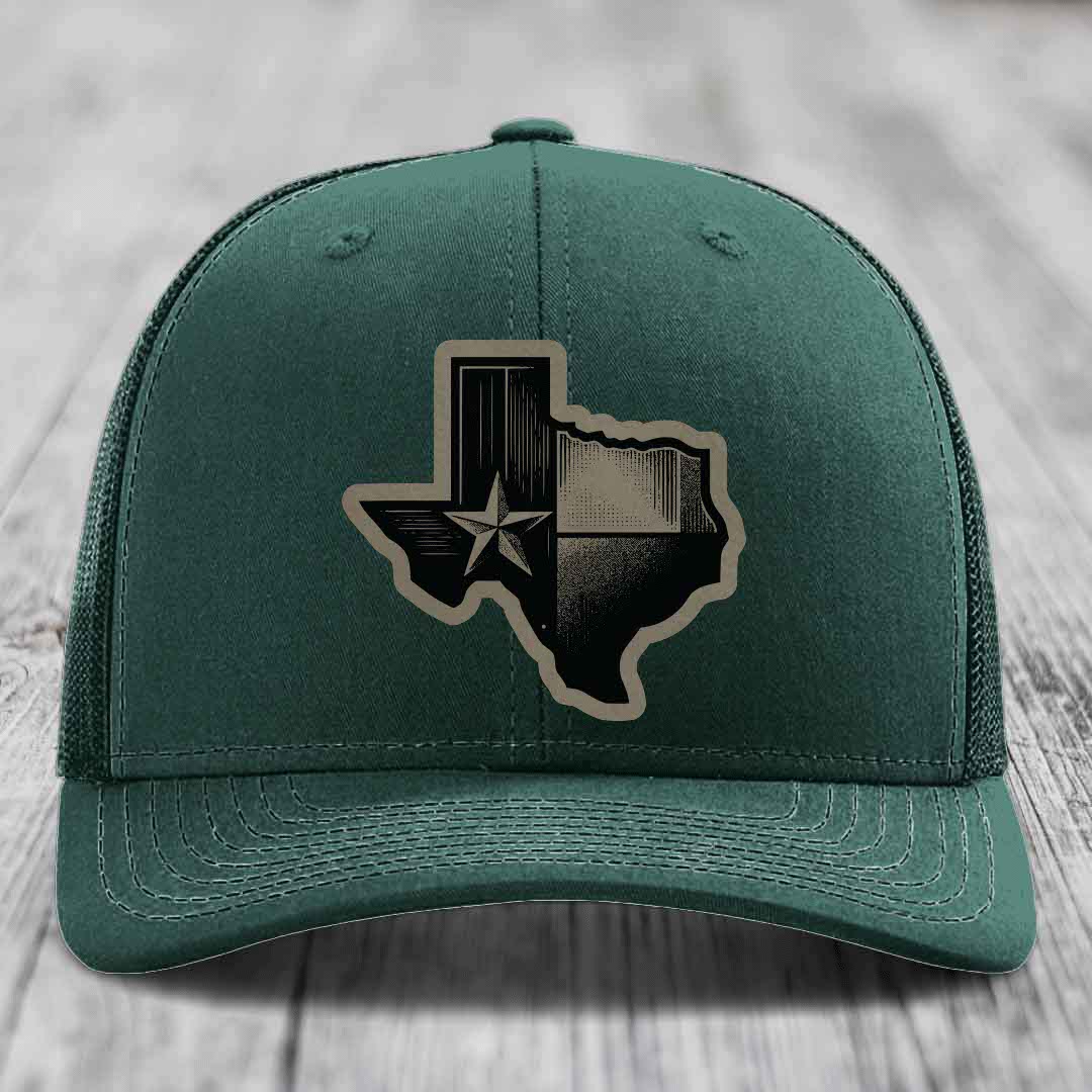 Green trucker hat with Texas-shaped patch featuring star and flag design.