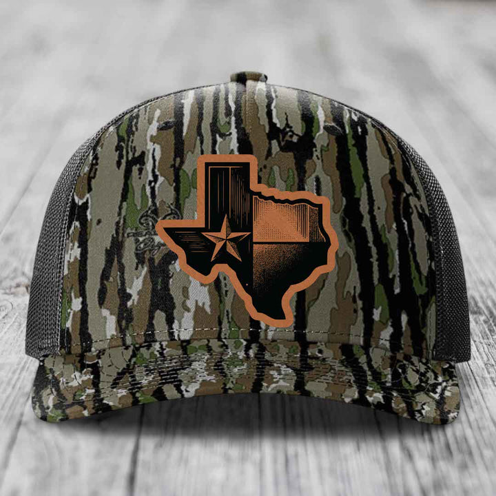 Camouflage trucker hat with Texas state flag patch in brown and black.