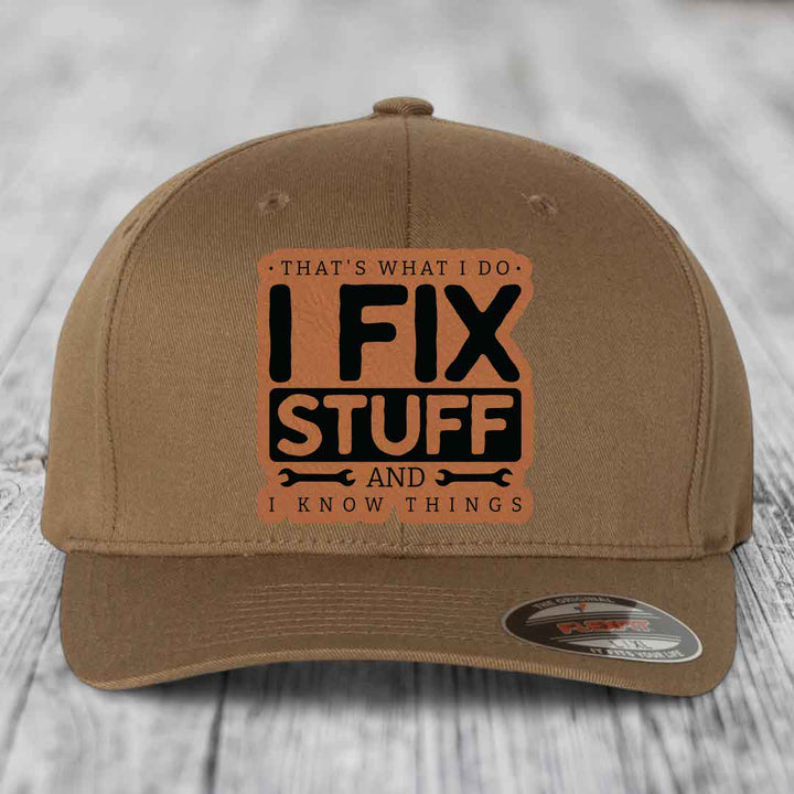 Thats What I Do, I Fix Stuff, And I Know Things - Leather Patch Hat - Rawhide to Black Patch - Flexfit 6277 Fitted Hat