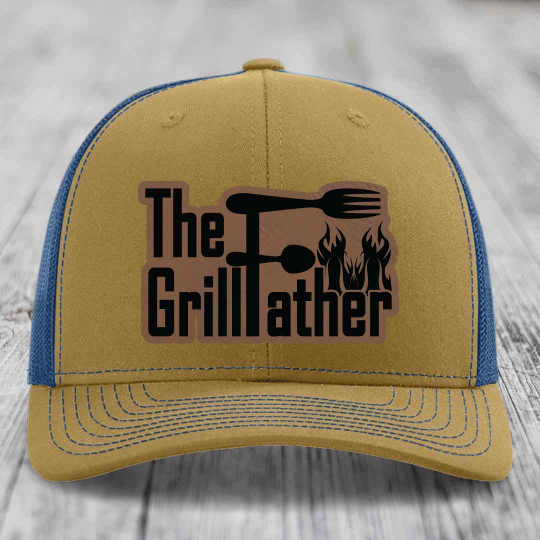Tan and blue trucker hat with &