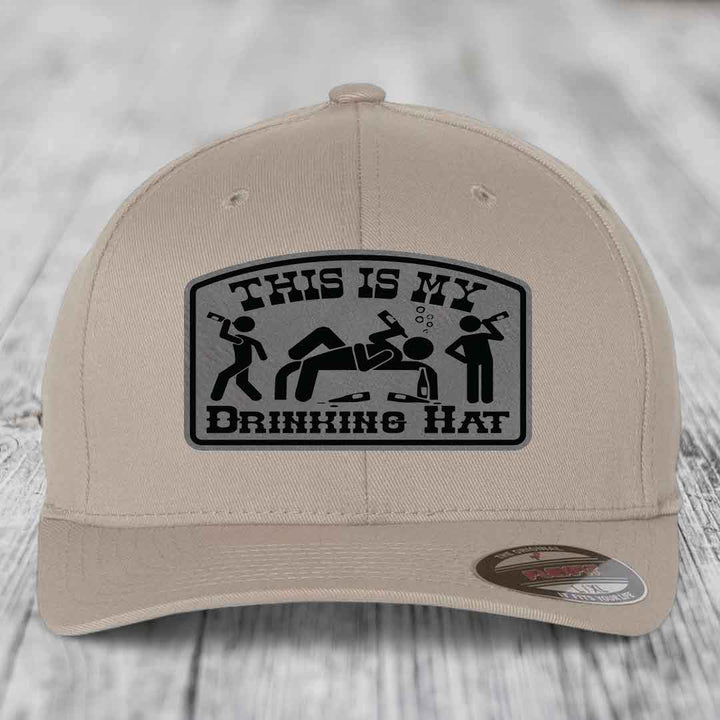 Tan baseball cap with black &