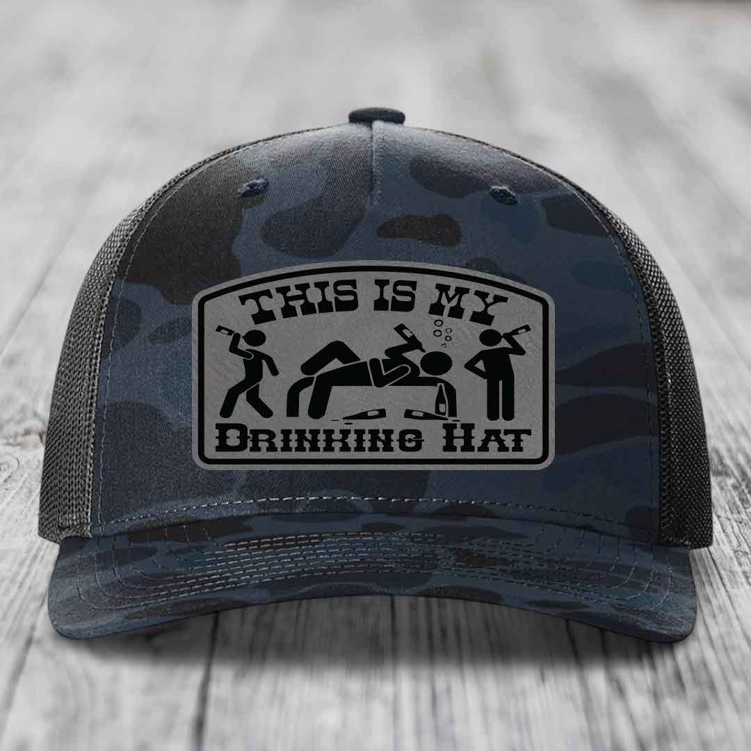 Camouflage trucker hat with a black and gray &