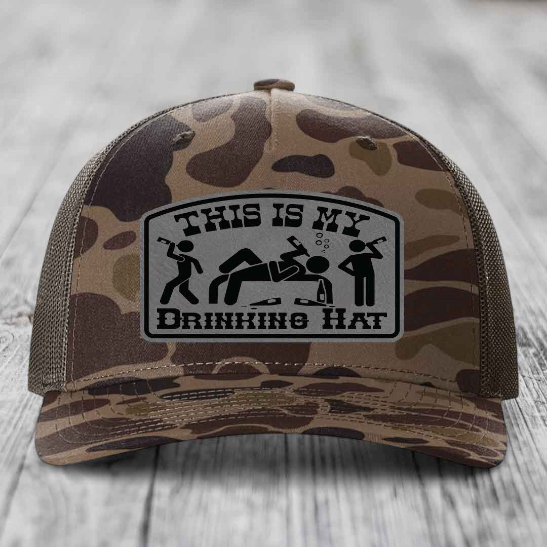 Camouflage trucker hat with a black and grey &
