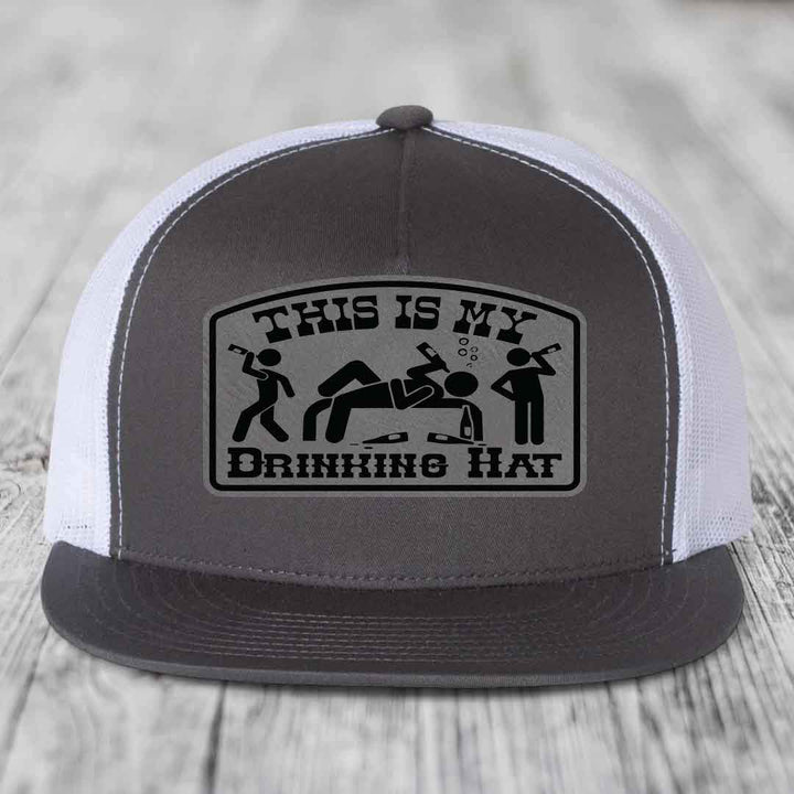 Grey and white trucker hat with black &