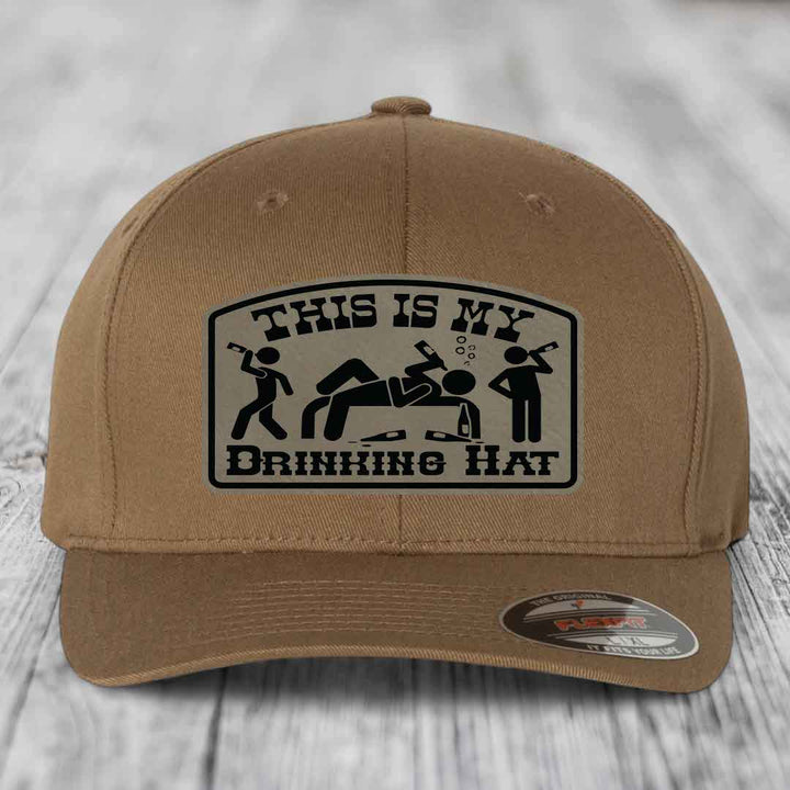 Tan baseball cap with black and beige &