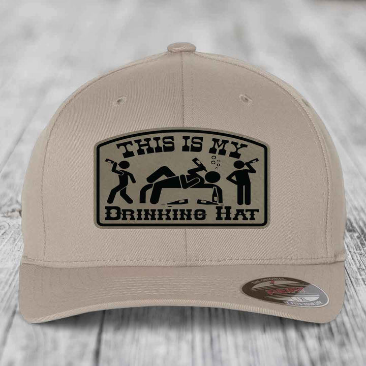 Beige baseball cap with black &