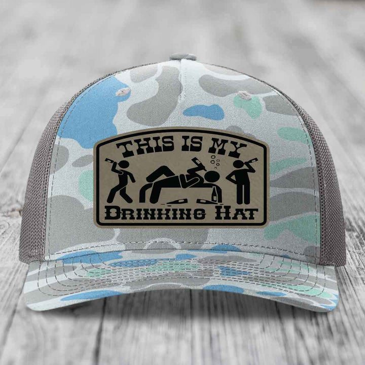 Camouflage trucker hat with &