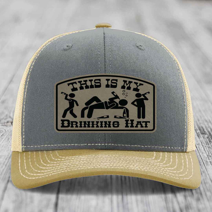 Grey and beige trucker hat with &