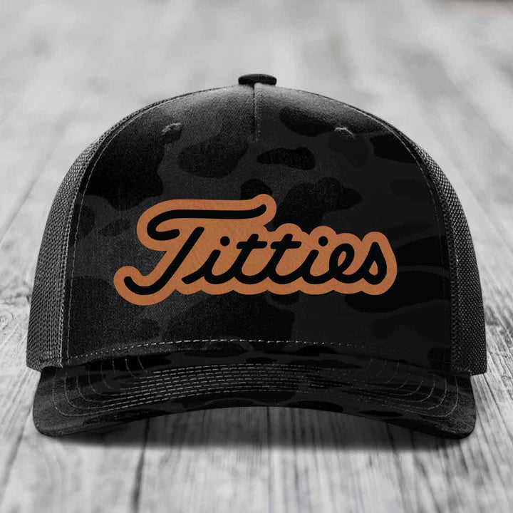 Black camouflage trucker hat with brown &