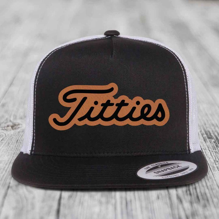 Black and white trucker hat with &
