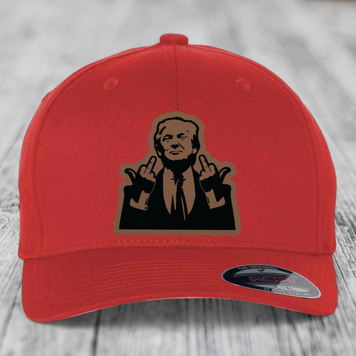 Red baseball cap with a graphic patch of a man making hand gestures.