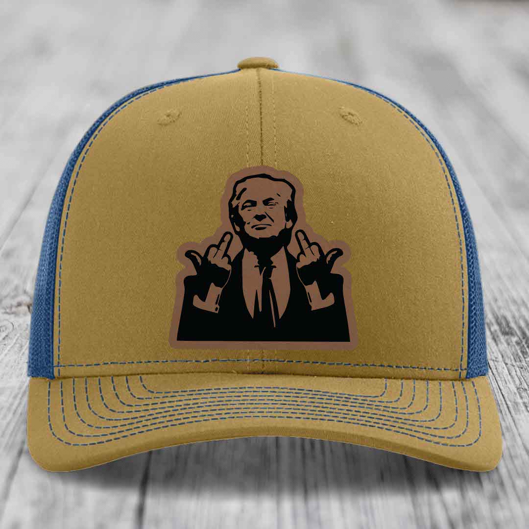 Tan and blue trucker hat with a black leather patch of a man making a hand gesture.