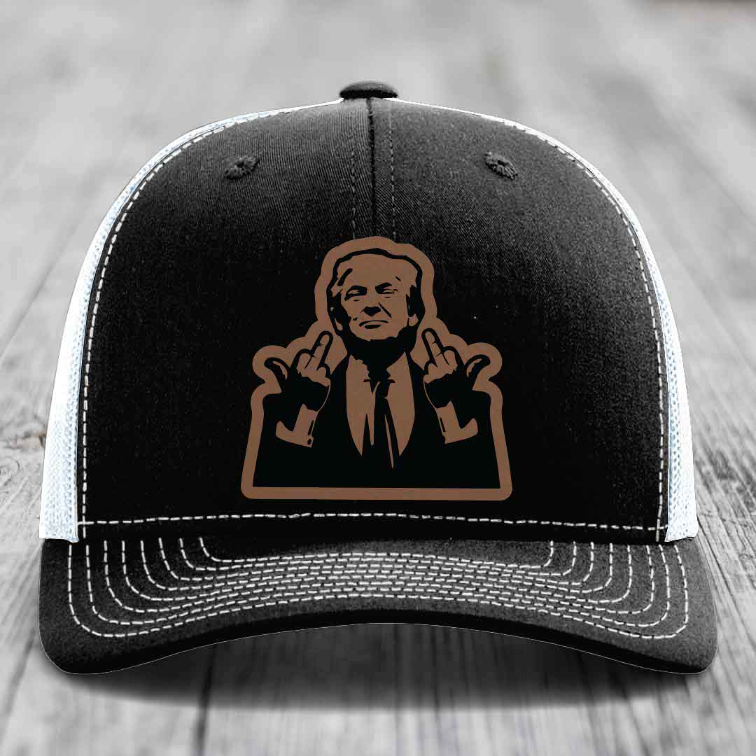 Black trucker hat with white mesh back and stitching, featuring a brown graphic of a man making rude hand gestures.