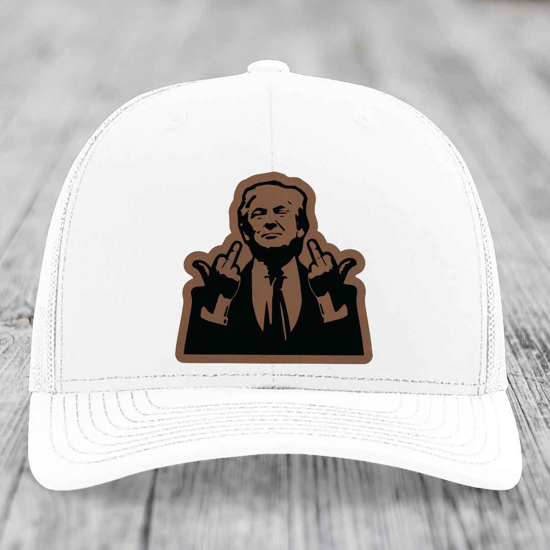 White trucker hat with brown leather patch of man making middle finger gesture.