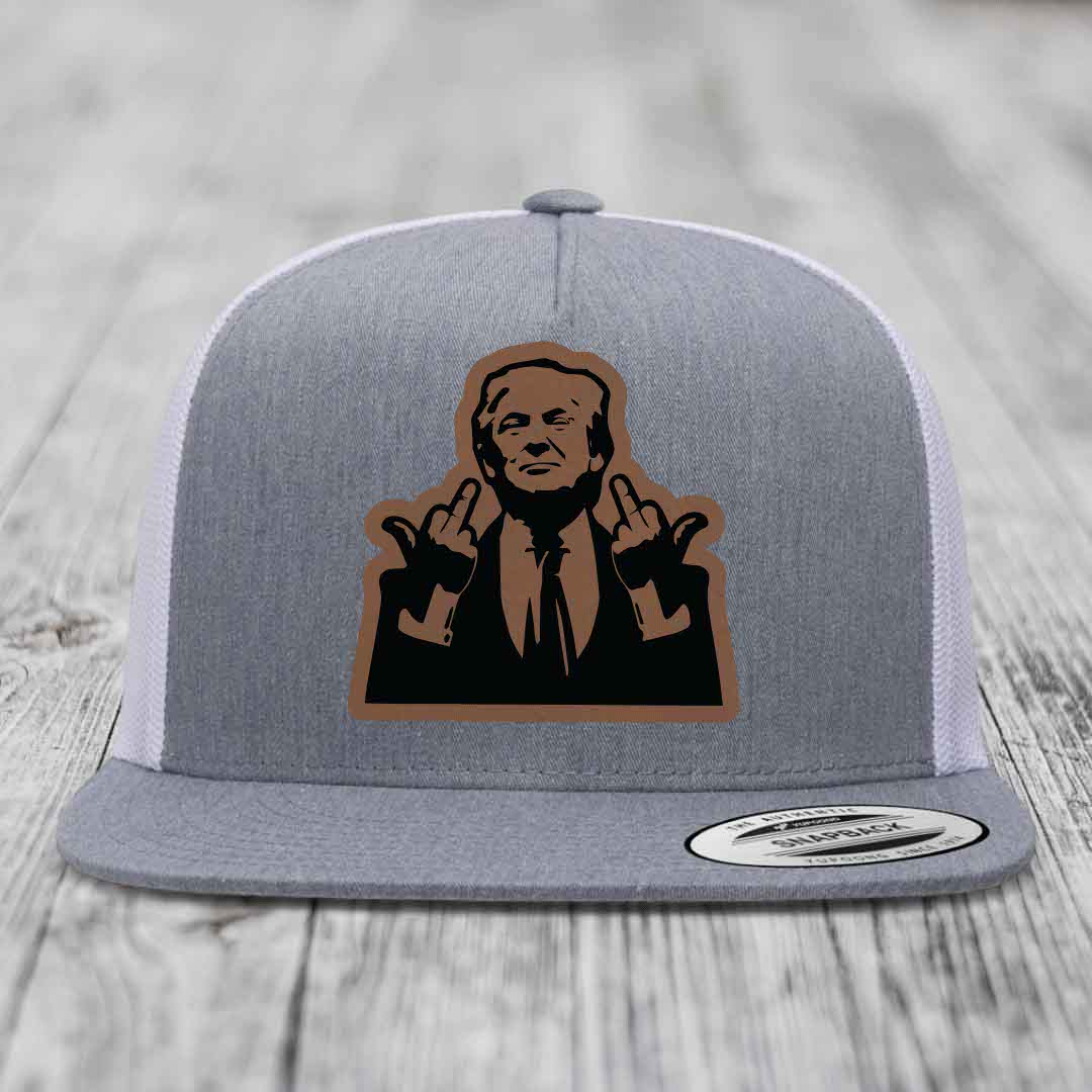 Grey trucker hat with brown and black patch of man making rude hand gesture.