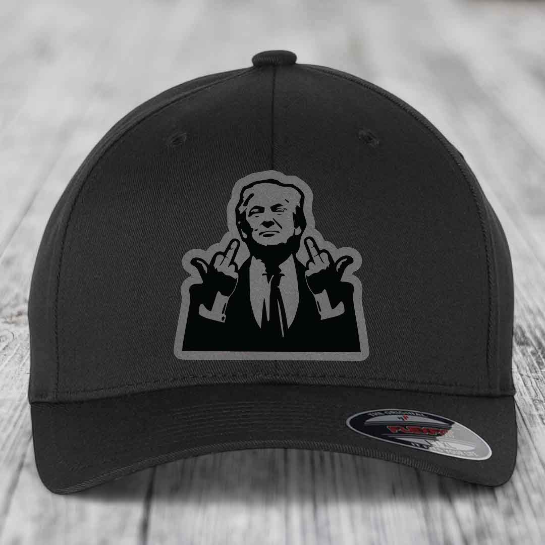 Black baseball cap with a graphic patch of a man making rude hand gestures.