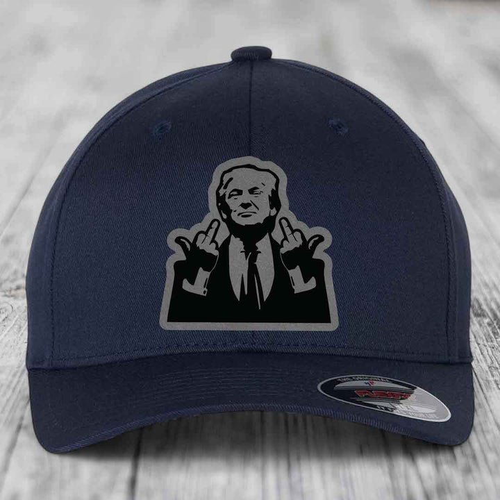 Dark blue baseball cap with a black and grey graphic patch of a man making hand gestures.