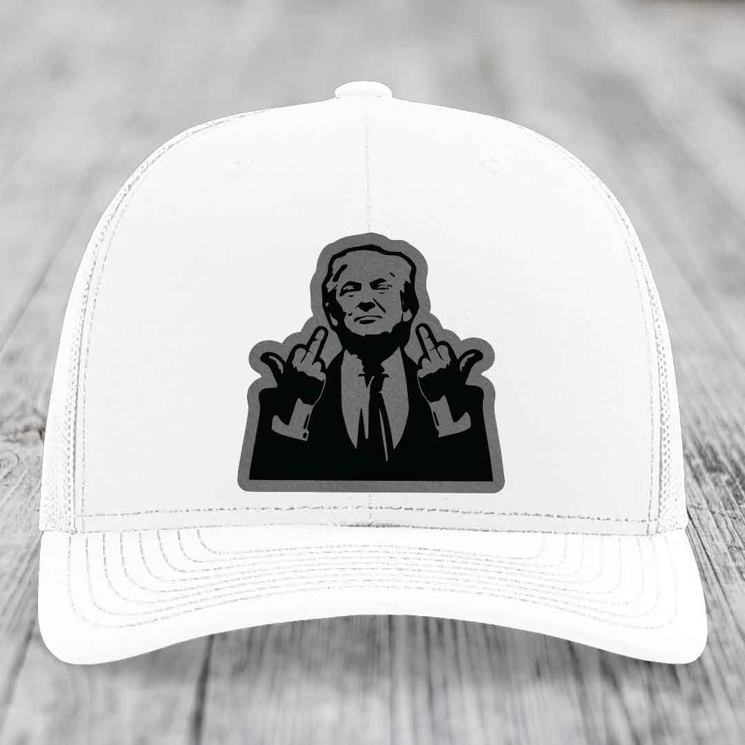 White trucker hat with black and grey patch of man making rude hand gesture