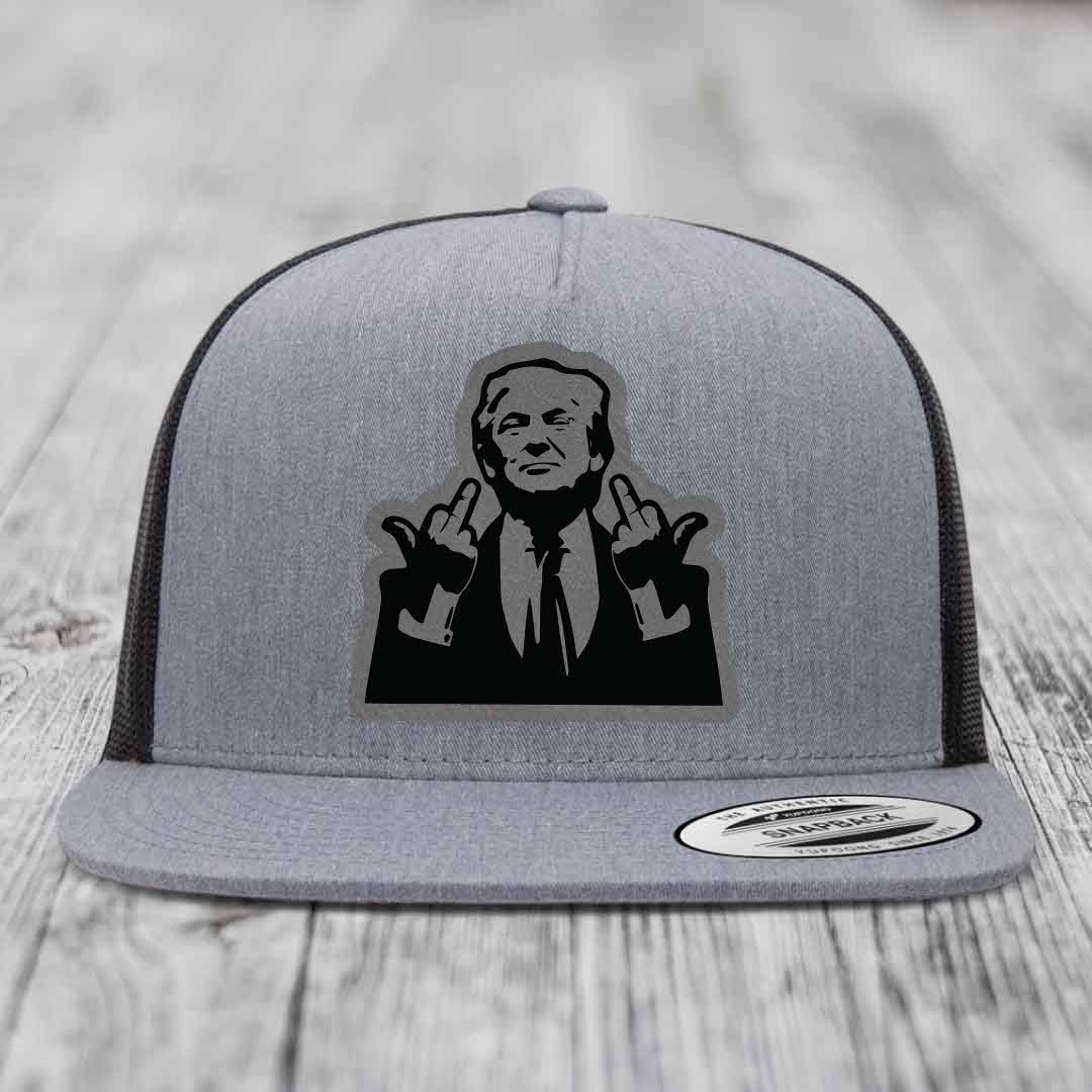 Grey trucker hat with black silhouette patch of man making rude hand gesture.