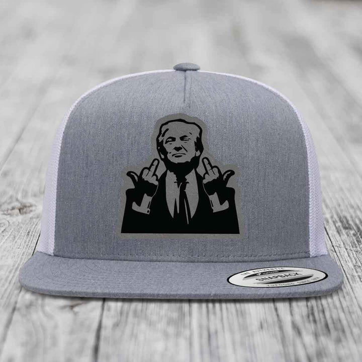 Grey trucker hat with black silhouette patch of man making two-finger salute, white mesh back, and snapback label.